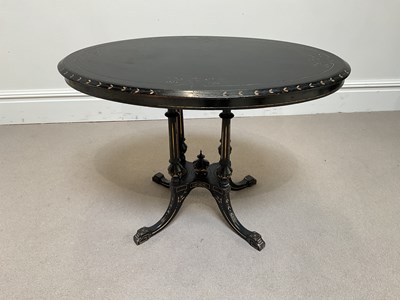 Lot 1093 - A Victorian ebonised oval loo table, with gilt...