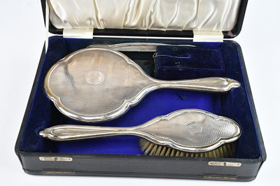 Lot 222 - JOSEPH GLOSTER LTD; a hallmarked silver three...