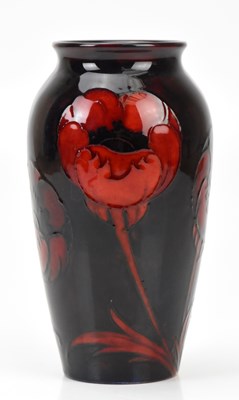 Lot 314 - WILLIAM MOORCROFT; a good flambé vase of...
