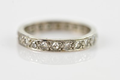 Lot 504 - A white metal diamond set full eternity ring...