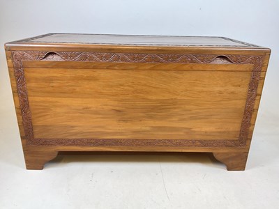 Lot 718 - A mid century camphor wood chest with interior...