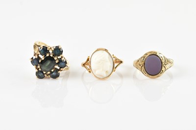 Lot 617 - A yellow metal cluster dress ring set with...