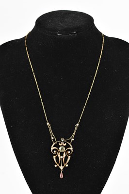 Lot 369 - A good Edwardian yellow metal pendant set with...