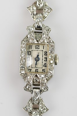 Lot 1040 - An Art Deco diamond set platinum lady's...