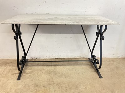 Lot 719 - A marble topped console table with metal base...