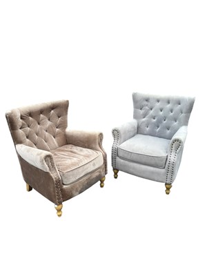 Lot 1029 - Two modern grey upholstered wingback elbow...