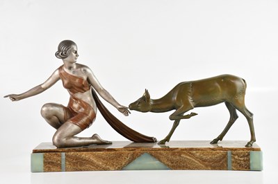 Lot 152 - An Art Deco patinated spelter figure group...
