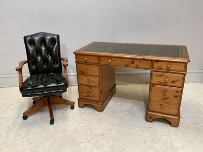 Lot 1068 - A modern pine desk with leather top, height...
