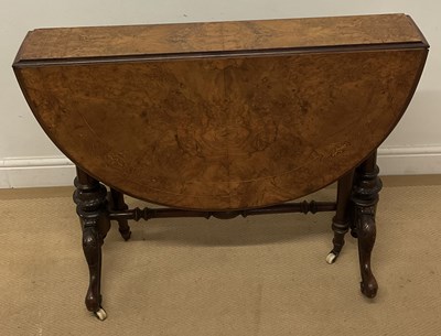 Lot 639 - A Victorian walnut Sutherland table raised on...