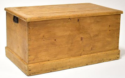 Lot 52 - A pine coffer with plank top on a body with...
