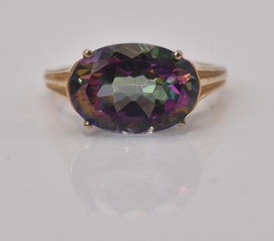 Lot 476 - A 9ct yellow gold oval mystic topaz ring, size...