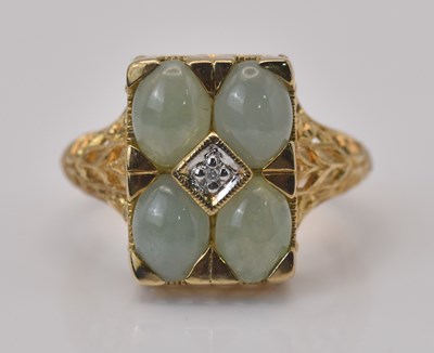Lot 469 - A 9ct yellow gold jade and diamond plaque ring,...