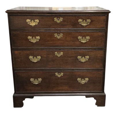 Lot 36 - A 19th century oak chest of four long drawers,...