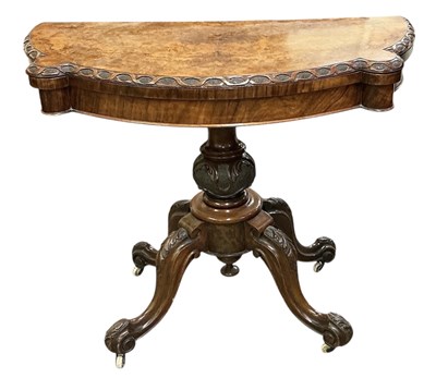 Lot 76 - An early 20th century burr walnut demi-lune...