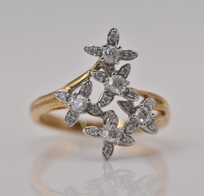 Lot 477 - A 9ct yellow gold diamond cluster star set...