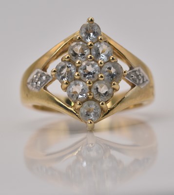 Lot 453 - A 9ct yellow gold aquamarine and white topaz...