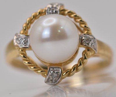 Lot 482 - A 9ct yellow gold cultured pearl and diamond...
