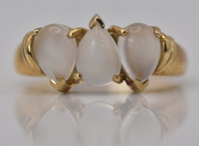 Lot 483 - A 9ct yellow gold three stone pear shaped...