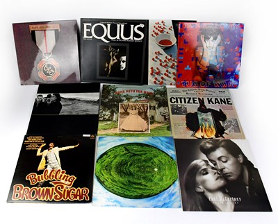 Lot 259 - A mixed lot to include three albums by Paul...