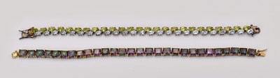 Lot 457 - A 9ct yellow gold mystic topaz square cut line...