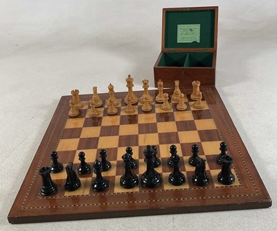 Lot 68 - STAUNTON; a weighted wooden and stained wooden...