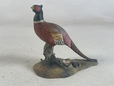 Lot 262 - ROYAL CROWN DERBY; a porcelain bird figure of...
