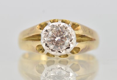 Lot 1231 - An 18ct yellow gold diamond solitaire ring,...