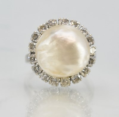 Lot 1324 - A 9ct white gold pearl and diamond cluster...