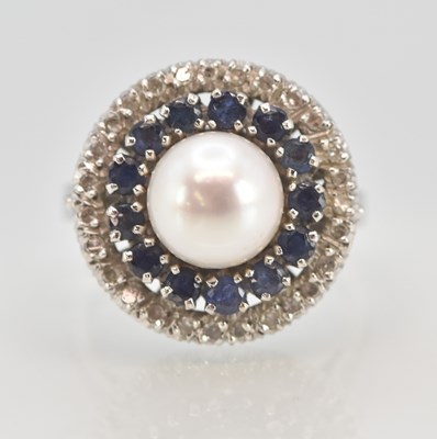 Lot 1323 - An 18ct white gold Art Deco pearl, sapphire...