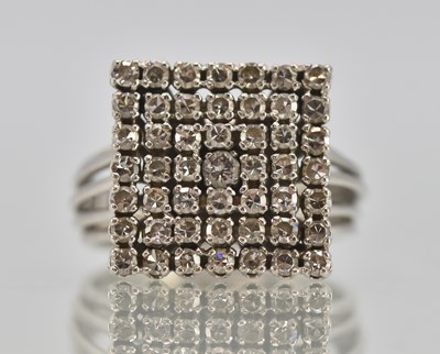 Lot 1269 - A 9ct white gold diamond cluster ring, the...