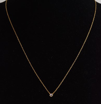 Lot 1367 - An 18ct yellow gold diamond pendant, the...