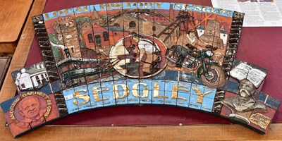 Lot 194 - A terracotta tiled wall mural celebrating...