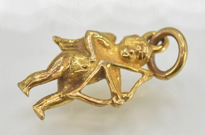 Lot 1406 - A 9ct yellow gold necklace pendant in the form...