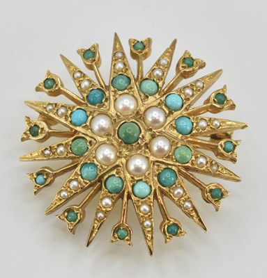Lot 1425 - A 9ct yellow gold brooch of starburst form,...