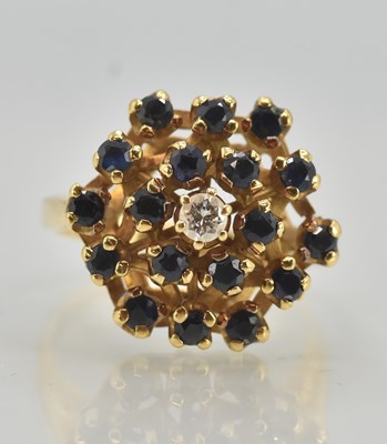 Lot 1181 - An 18ct yellow gold contemporary ring...