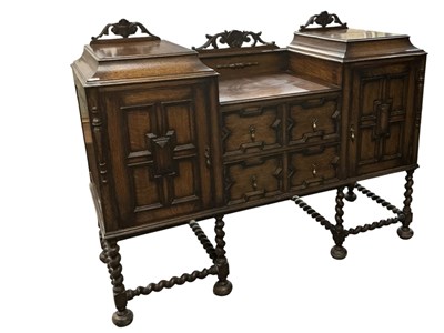 Lot 39 - An early 20th century carved oak twin pedestal...