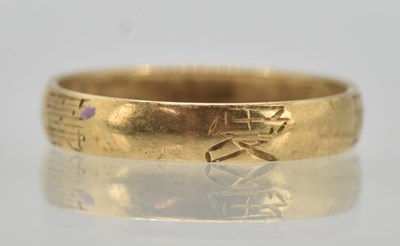 Lot 1327 - A 9ct yellow gold band ring, size N, approx...