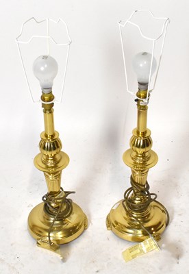 Lot 1547 - A pair of brass table lamps