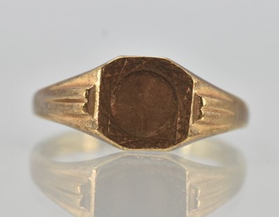 Lot 1262 - A 9ct yellow gold small signet ring, size O,...