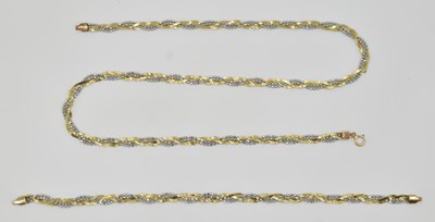 Lot 1152 - A 9ct two colour gold necklace and bracelet...