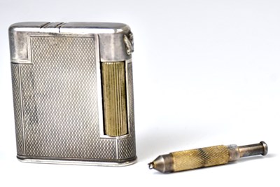 Lot 315 - CHARLES; a c.1940s lighter with engine turned...