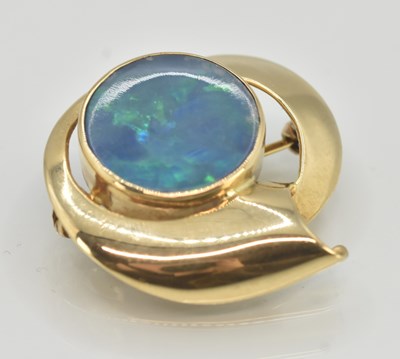 Lot 1497 - A contemporary 9ct gold brooch in the form of...
