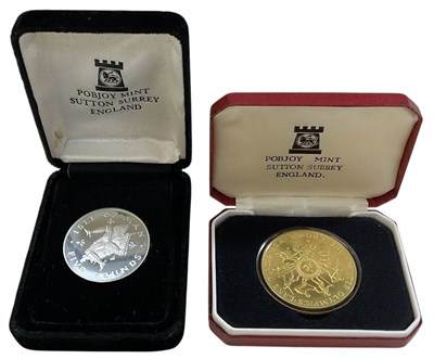 Lot 1597 - POBJOY MINT; two silver commemorative Isle of...