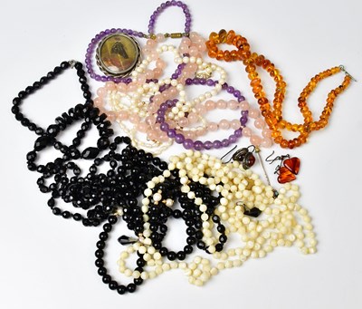 Lot 860 - A group of beaded necklaces, comprising a...