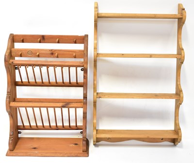 Lot 11 - Two plate racks, one modern waxed pine example,...