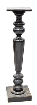 Lot 64 - A black lacquered wood torchère, with square...
