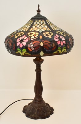 Lot 83 - A large Tiffany-style lamp, with floral design,...