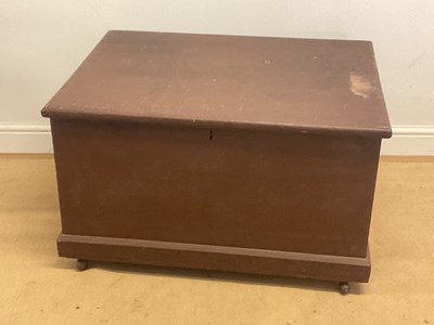 Lot 645 - A painted pine blanket chest on castors with...