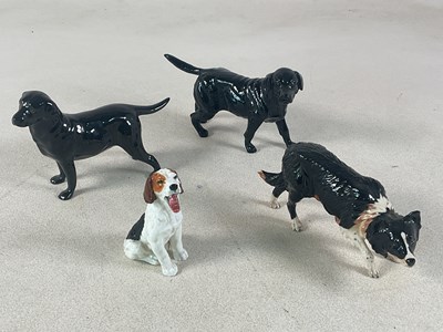Lot 282 - ROYAL DOULTON; four ceramic models comprising...