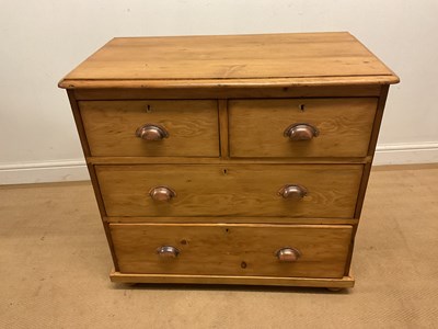 Lot 637 - A pine chest of two short over two long...